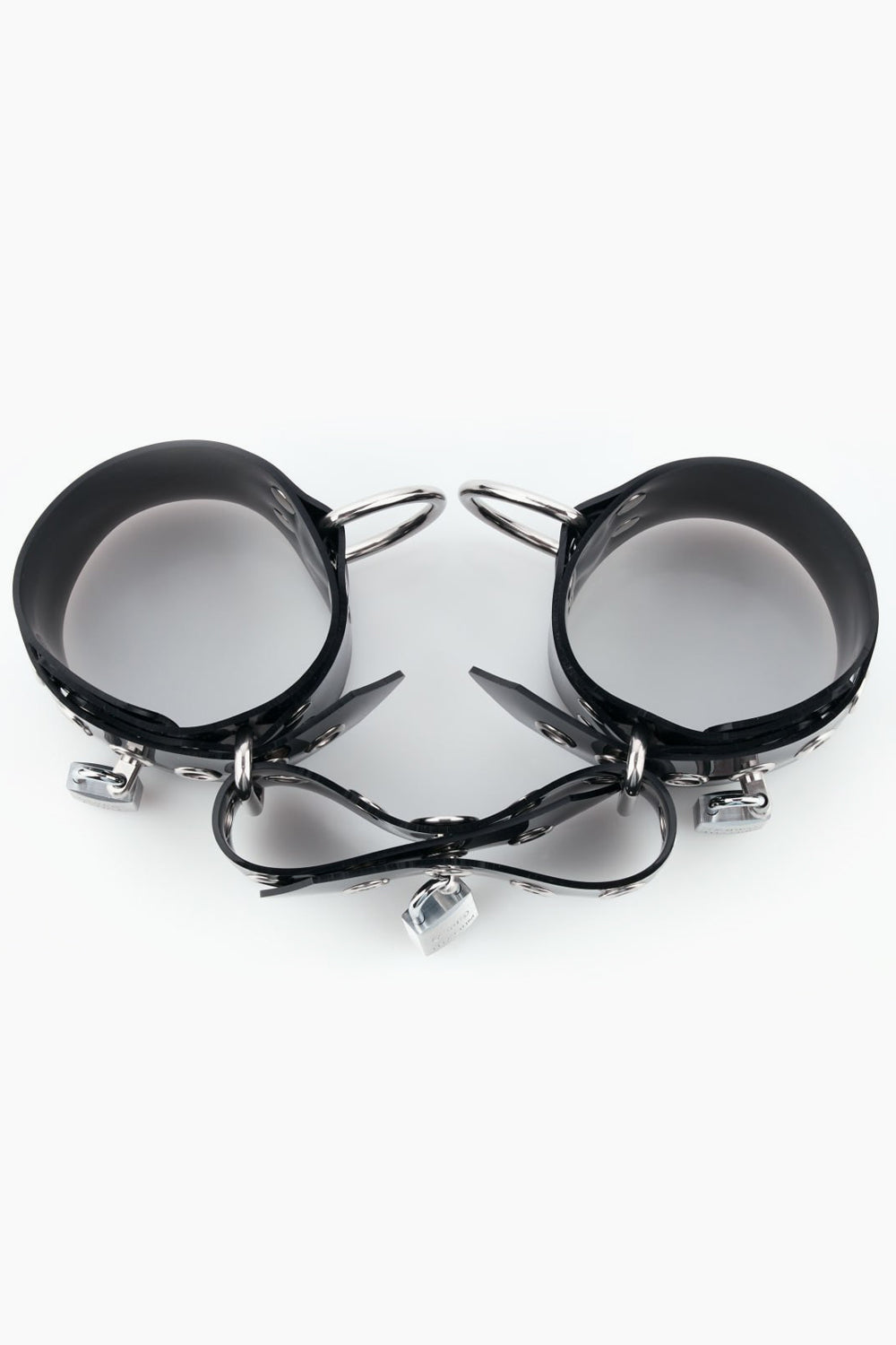 Buck-less ankle cuffs with D-rings and padlocks