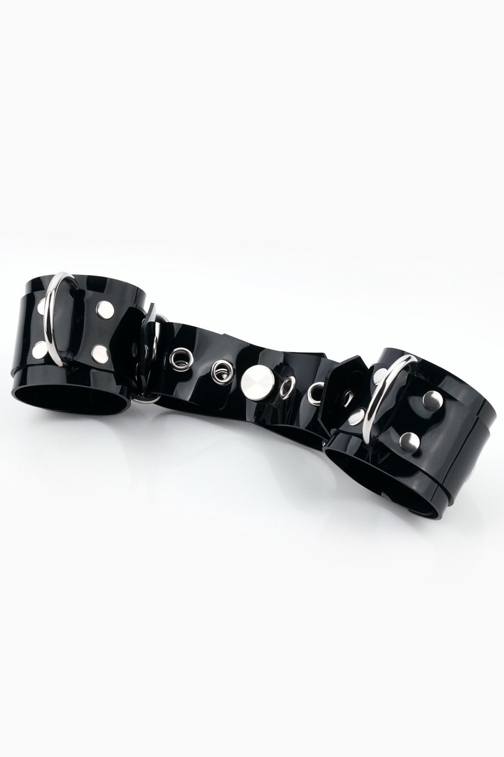 Buck-less wrist cuffs with D-rings and padlocks