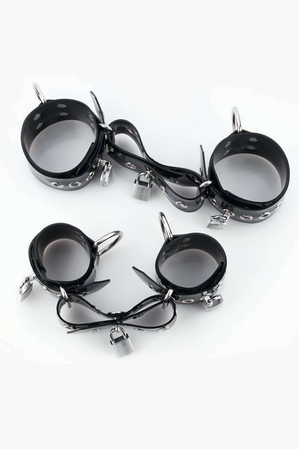 Lockable buck-less set of wrist and ankle cuffs