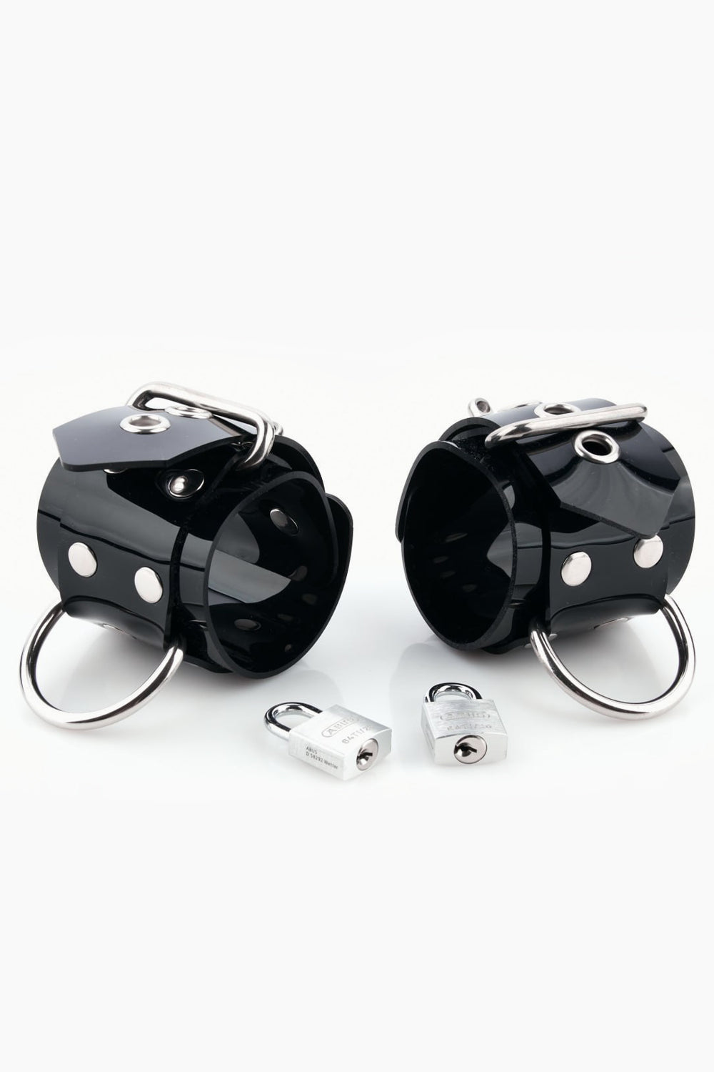 Buck-less wrist cuffs with D-rings and padlocks