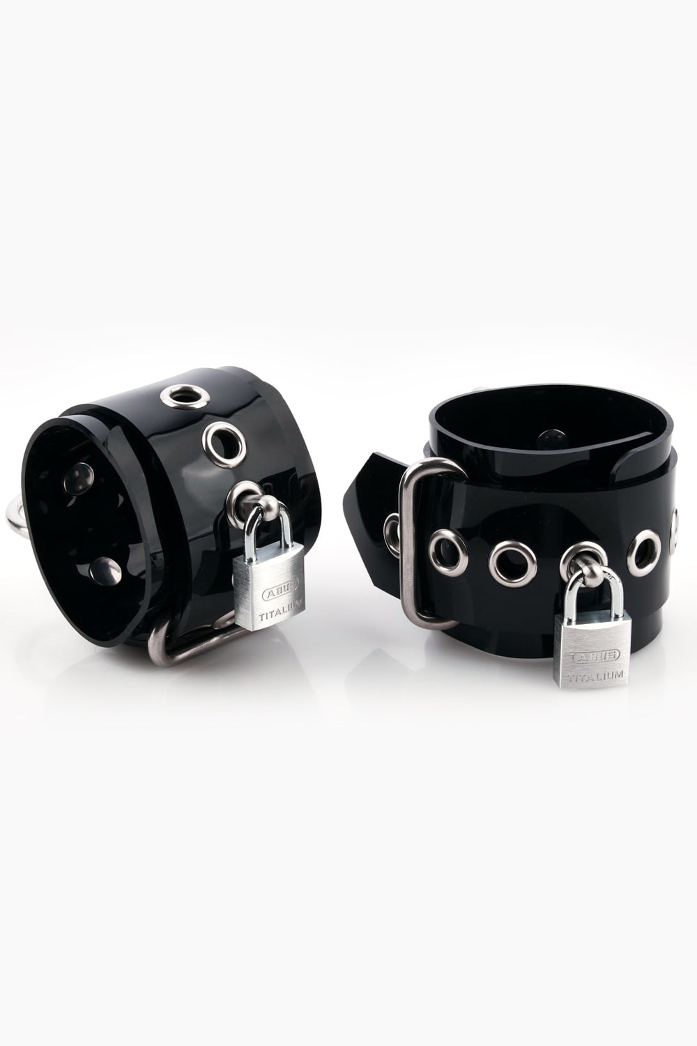 Buck-less wrist cuffs with D-rings and padlocks